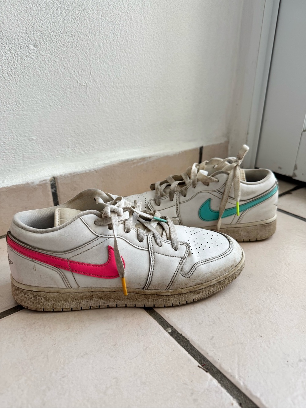 White Low-Top Sneakers with Pink and Teal Swoosh